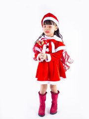 Asian girl is wearing a Santa costume to celebrate Christmas. White background