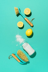 Eco-friendly natural cleaners, cleaning products against chemical detergent bottles. Cleaning tools...