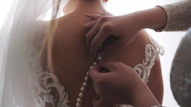 Maid Of Honour Buttons bride dress before wedding