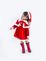 Asian girl is wearing a Santa costume to celebrate Christmas. White background