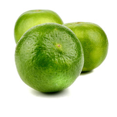 Ripe slice of green lime citrus fruit stand isolated on white background,element of food healthy nutrients and fruit healthy concept