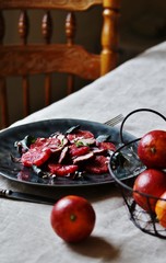 salad with red Sicilian orange (blood orange), duck breast, beet top (chard), sunflower seeds, red onion. gourmet recipe, winter salad