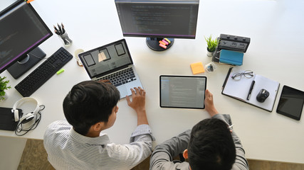 Developer programming and coding technologies. Software design. Cyber workspace concept with top view.