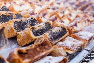 National Hungarian delicious strudel with poppy seeds and cottage cheese at the Christmas market in Budapest