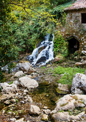 Fototapeta na wymiar Ancient water mill in the natural reserve of Morigerati
