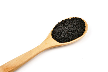 Lemon basil seeds in wooden spoon isolated on white background.food for help Reduce Cholesterol Levels For those who need to control weight