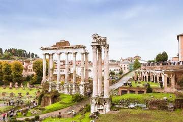 Naklejka premium Roman Forum, Forum Romanum in Latin, a rectangular square surrounded by the ruins of several important ancient government buildings at the center of Rome in Italy.