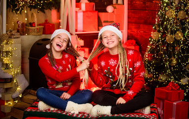 Obraz na płótnie Canvas Joyful christmas. Friendly relations. Girls friends soulmates celebrate christmas. Happy holidays. Fun and cheer. Best friends forever. Lovely kids. Children cheerful christmas eve. Happiness joy