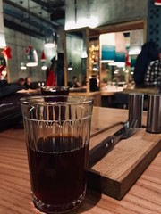 Coffe in a glass interior of a restaurant