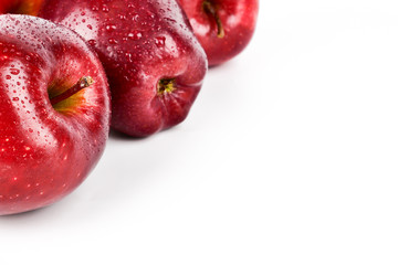 Fresh Red delicious apples with drops of water isolated on white background, Healthy fruit and Diet concept with Copy Space for text