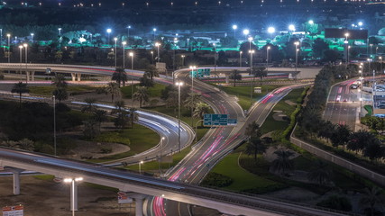 Fototapeta premium Aerial top view to Sheikh Zayed road near Dubai Marina and JLT timelapse, Dubai.