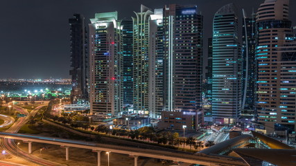 Fototapeta na wymiar Aerial top view to Sheikh Zayed road near Dubai Marina and JLT timelapse, Dubai.