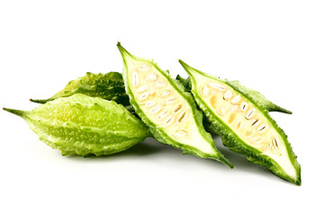 Balsam apple, Bitter cucumber, Bitter gourd, Balsam pear (momordica charantia) isolated on white...