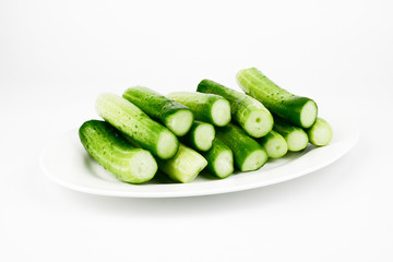 Fresh cucumber, chopped cucumber, salad ingredient,isolated on white background.