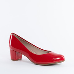 Beautiful patent leather women's shoes in red. On white background. heels. Choose other angles of this boot and new models in my profile