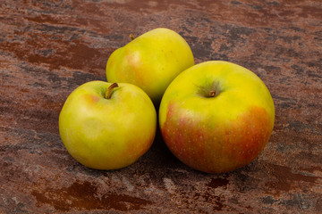 Ripe apples over background