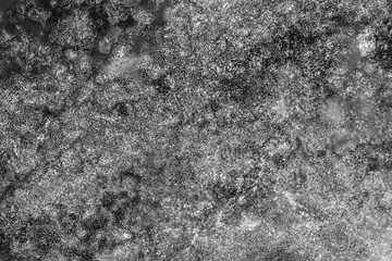 black and white decorative plaster background, dark gray stucco wall with copyspace , abstract...