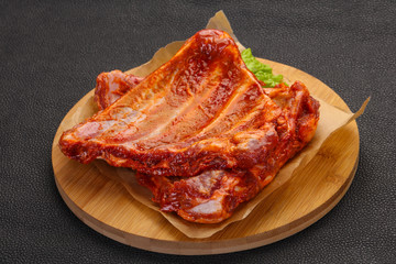 Raw marinated pork ribs