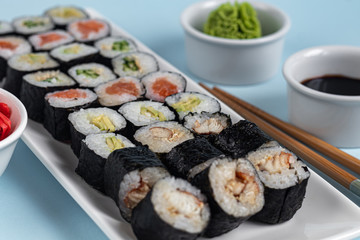 Sushi with fish, with cucumber, with eel, with avocado. Wrapped in Nori Seaweed. Food for...