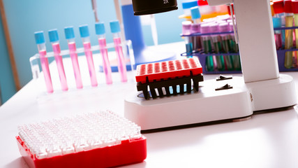 Laboratory of genetic research. PCR plates and multichannel pipettes