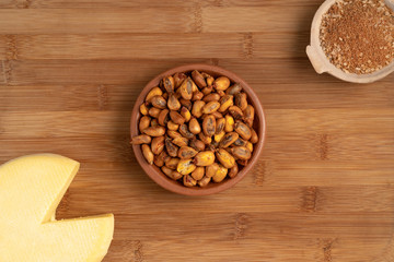 roasted corn, served with cheese and chili pepper. Typical dish of Ecuadorian cuisine called 
