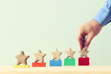 business concept image of setting a five star goal. increase rating or ranking, evaluation and...