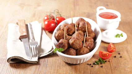 fried meatball with tomato sauce
