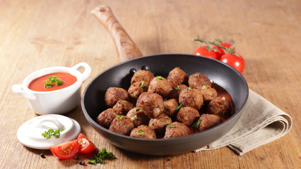 fried meatball with tomato sauce