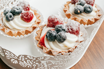 cake with fresh berries and cream