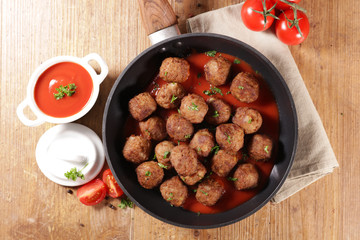 fried meatball with tomato sauce