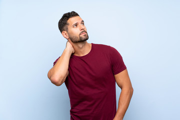 Handsome man over isolated blue background thinking an idea