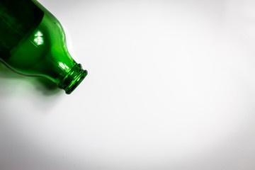 A single beer bottle against white background