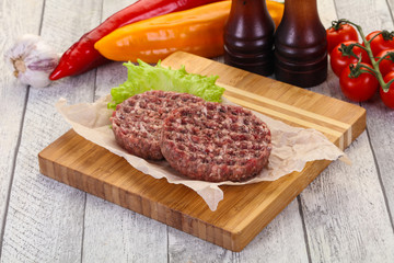 Raw burger cutlet