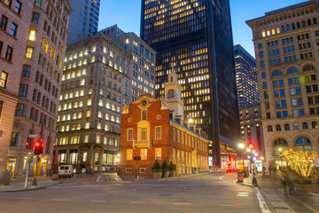 Old State House on historic Freedom Trail at night in blue hour in downtown Boston, Massachusetts, MA, MA, USA. This building was built in 1713 and is the oldest surviving public building in USA.