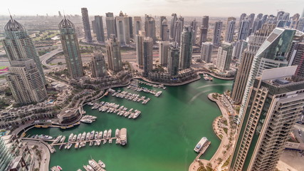 Dubai Marina skyscrapers and jumeirah lake towers view from the top aerial timelapse in the United...