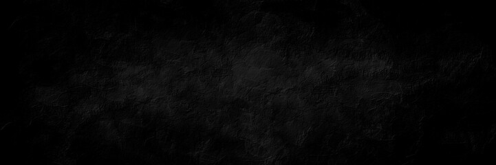 Dark charcoal color grungy cracked wall texture background with space for text or image