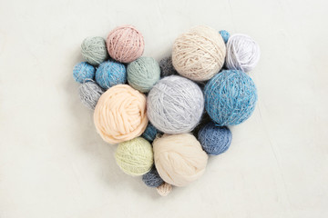 Heart from various balls of yarn for knitting - 305740675