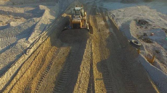 Close up side shot of road grader scraper on quarry 4K footage