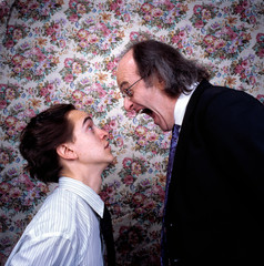 Businessman yelling at a colleague