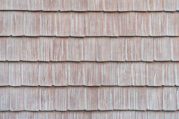 The texture of wooden tiles. Pattern of wooden roof tiles. Ecodesign.