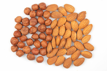 Different nuts on a white background. Vitamin wholesome food.