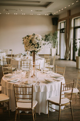 Wedding banquet tables with flowers decoration