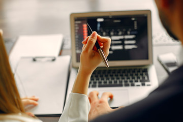 Businesspeople with a laptop. Close up keyboard.