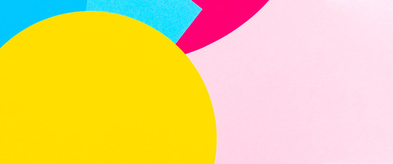 Texture background of fashion papers in memphis geometry style. Yellow, blue, magenta, pink colors....
