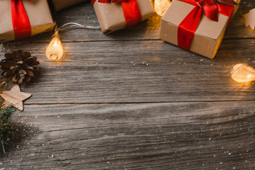 Xmas Gift Boxes On Wooden Surface With Lights
