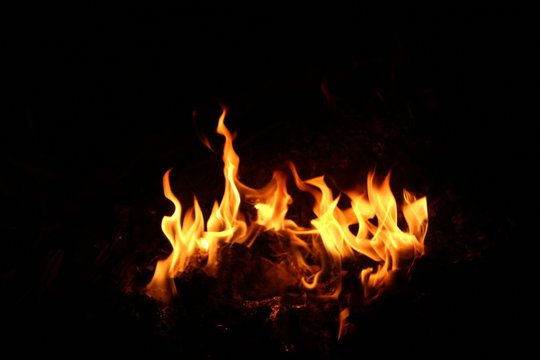 A small fire that burns On a black background
