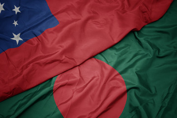 waving colorful flag of bangladesh and national flag of Samoa .