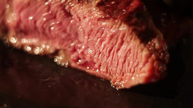 A piece of steak being cut