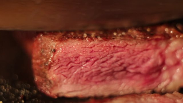 A piece of steak being cut