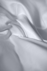 Sateen, satin. Gray. A cotton fabric woven like satin with a glossy surface.